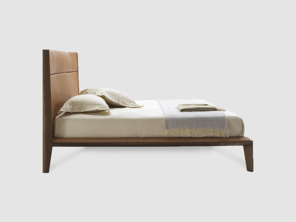 Italian luxury interiors bedroom custom leather bed
