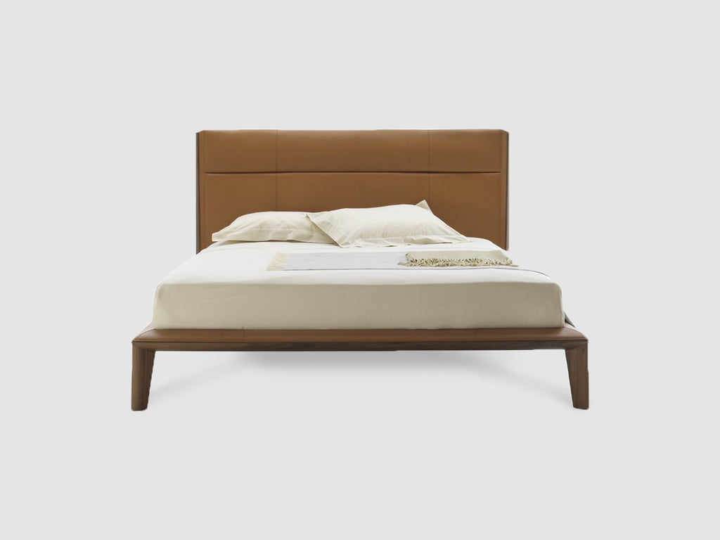 Italian luxury interiors bedroom custom leather bed